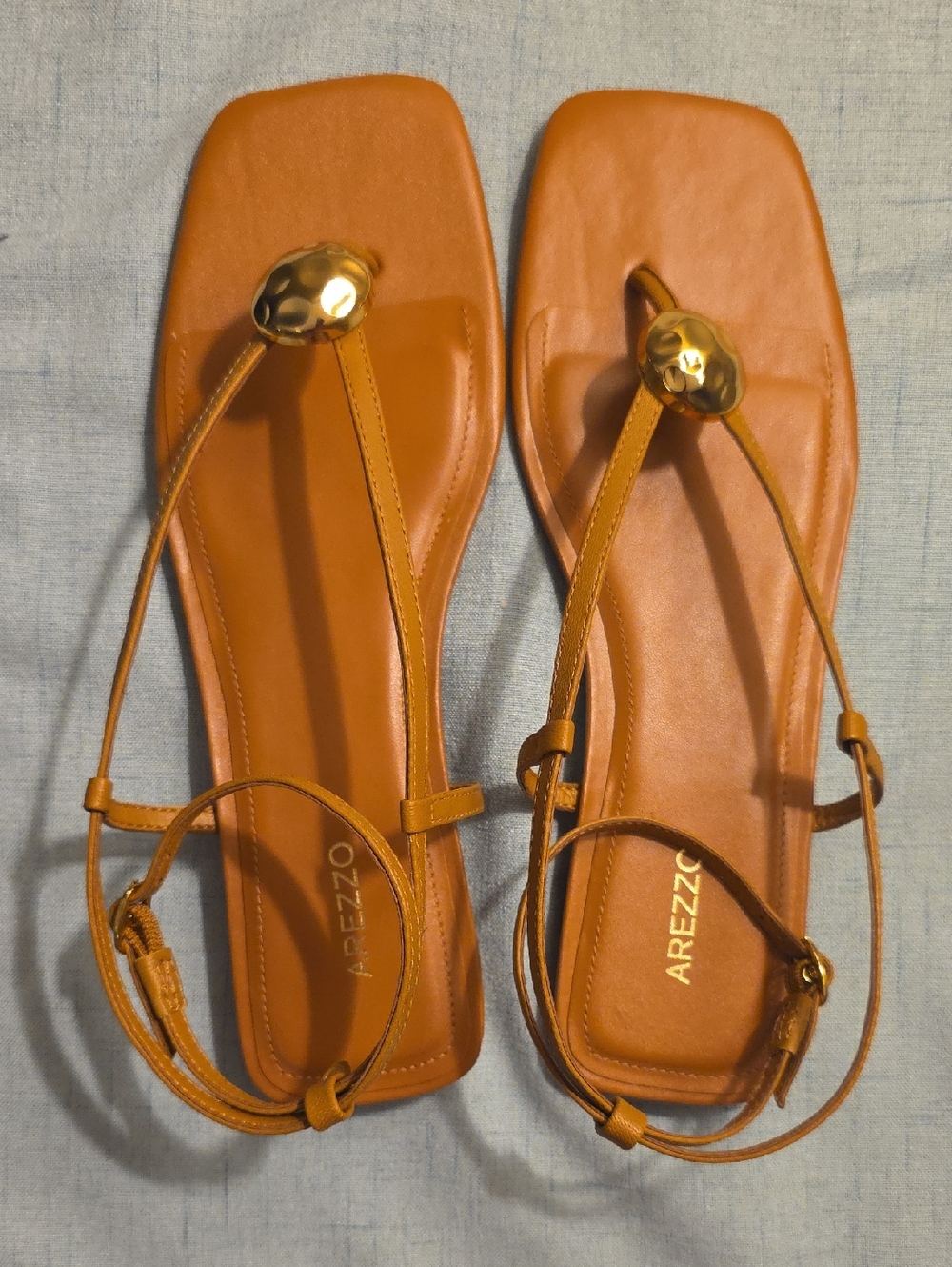 Arezzo Women's Cognac Leather Thong Sandals with Gold Accent